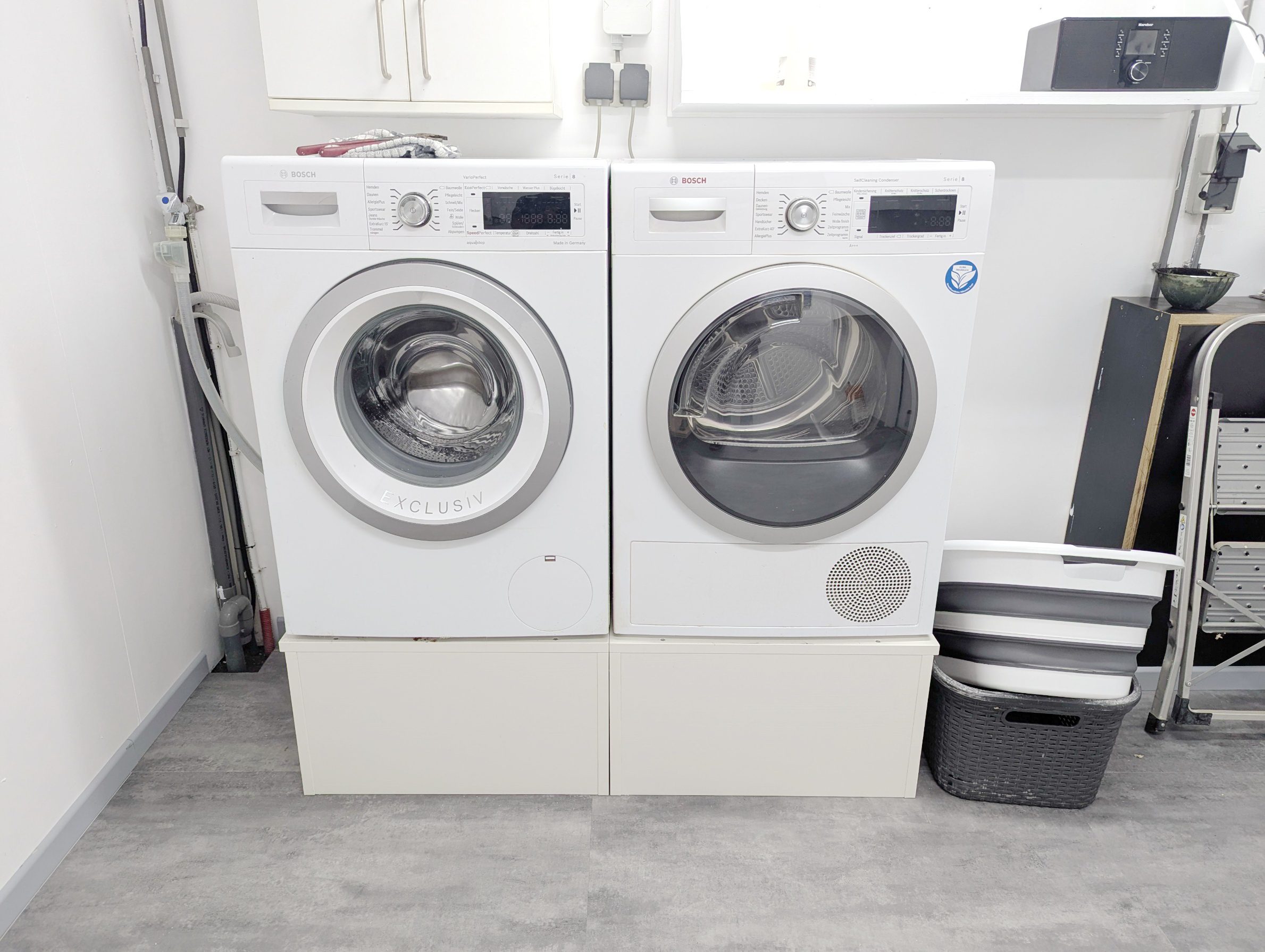 auf-Rollen Sockel Waschmaschine