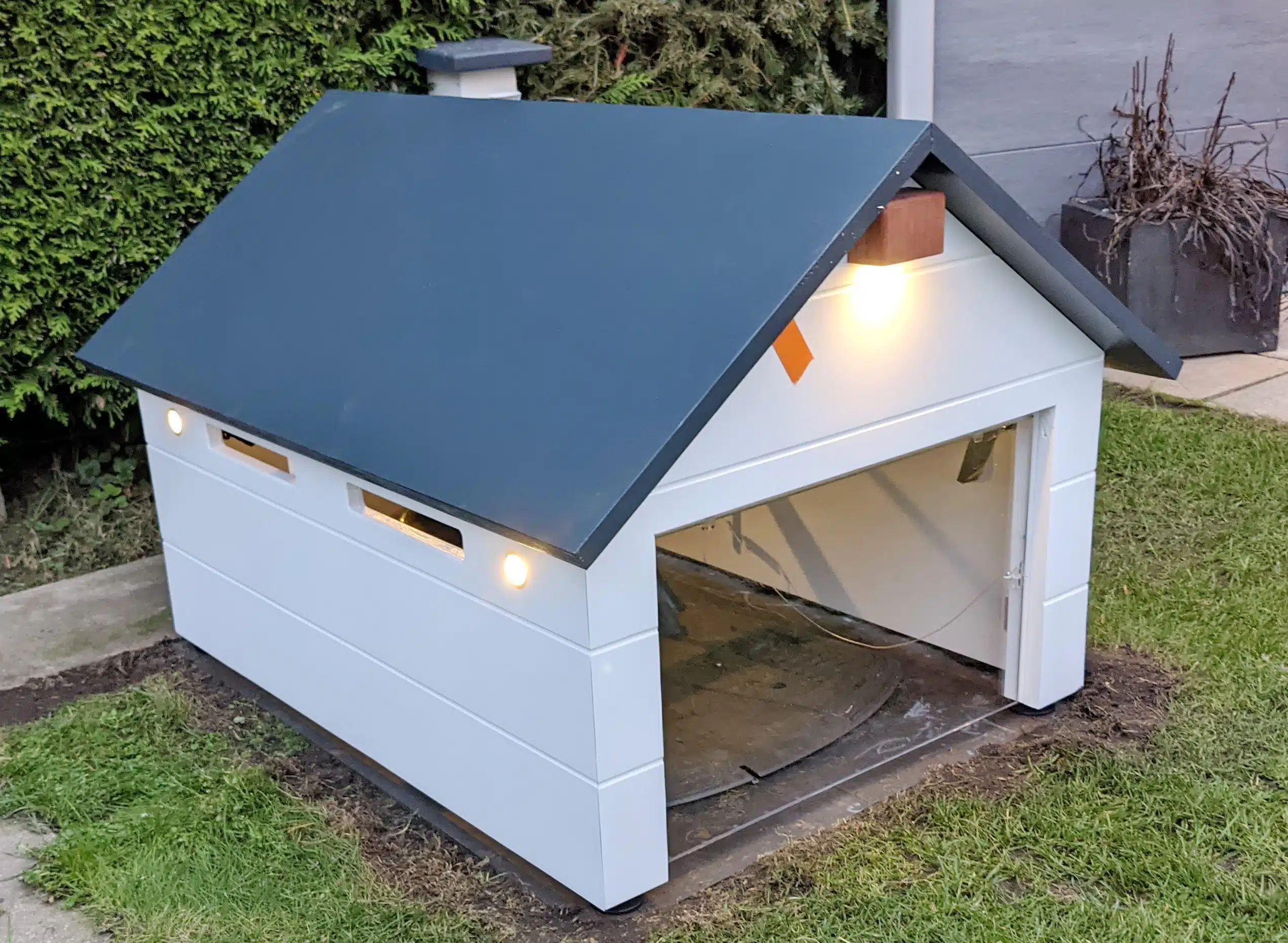 Garage für den Rasenroboter